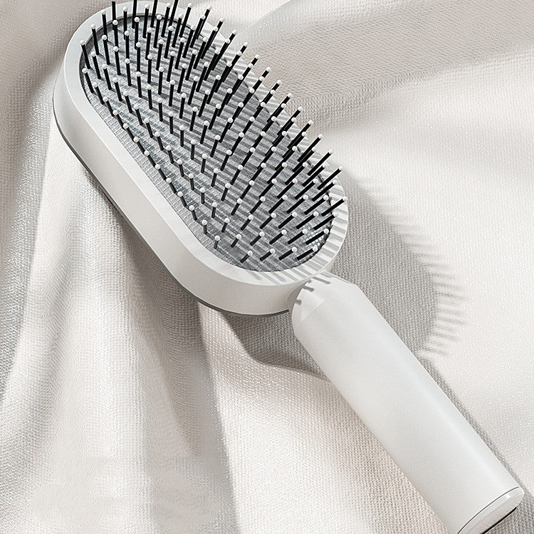 Self-cleaning hair brush for women