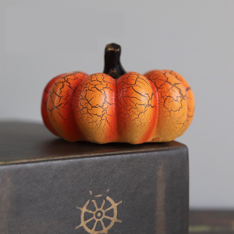 Simulated pumpkin light-emitting diode candle light.