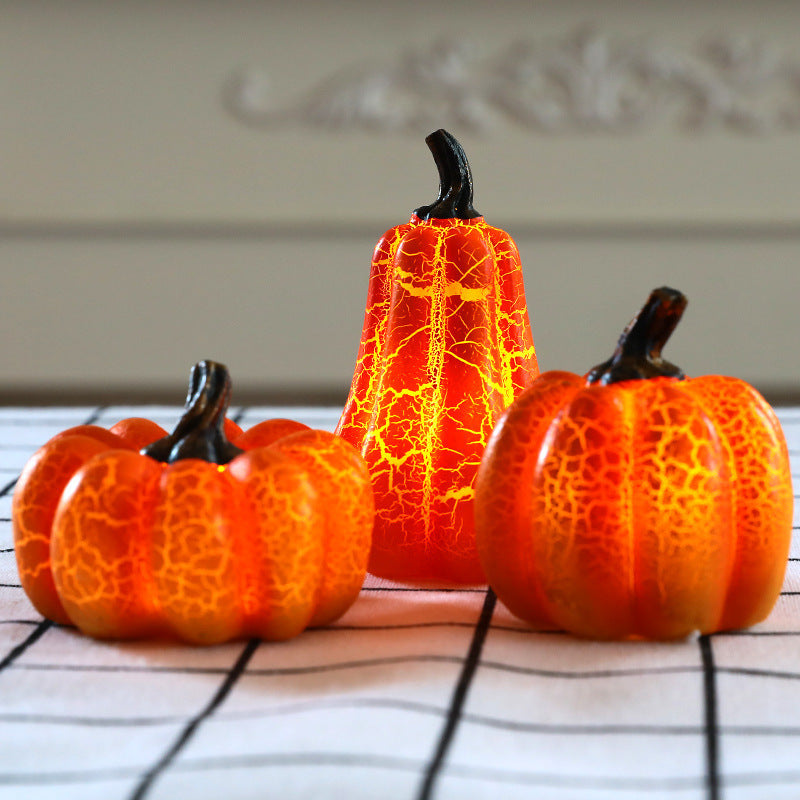 Simulated pumpkin light-emitting diode candle light.