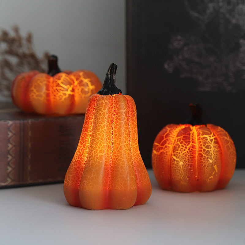 Simulated pumpkin light-emitting diode candle light.