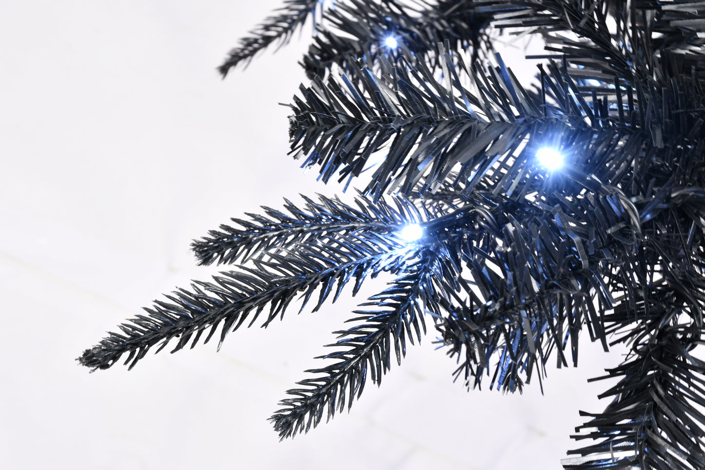 Elegant Black Christmas Tree with Twinkling Lights – Illuminate Your Holidays!