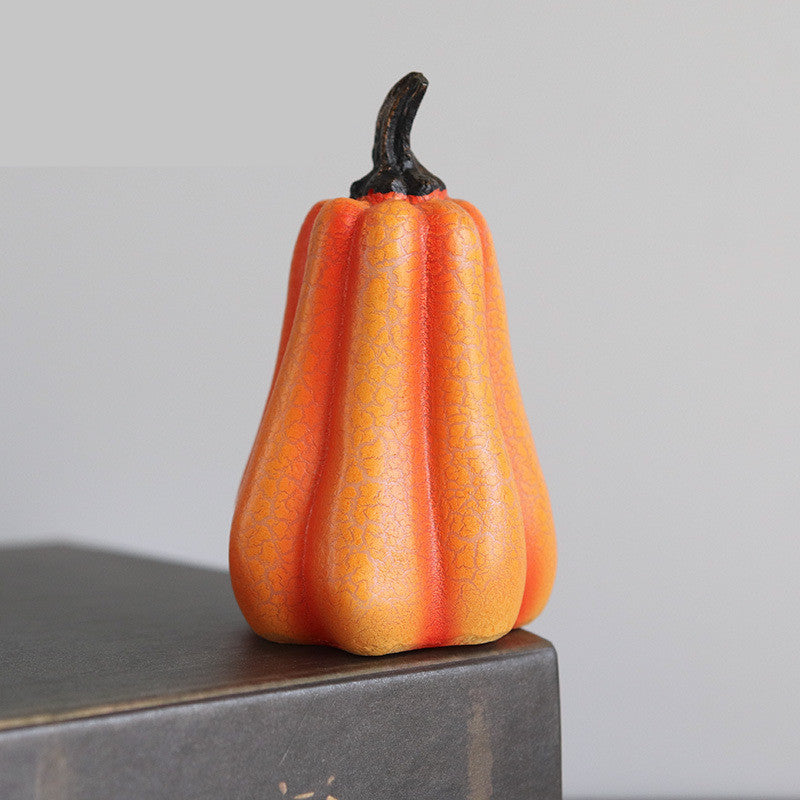 Simulated pumpkin light-emitting diode candle light.