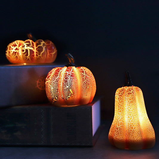 Simulated pumpkin light-emitting diode candle light.